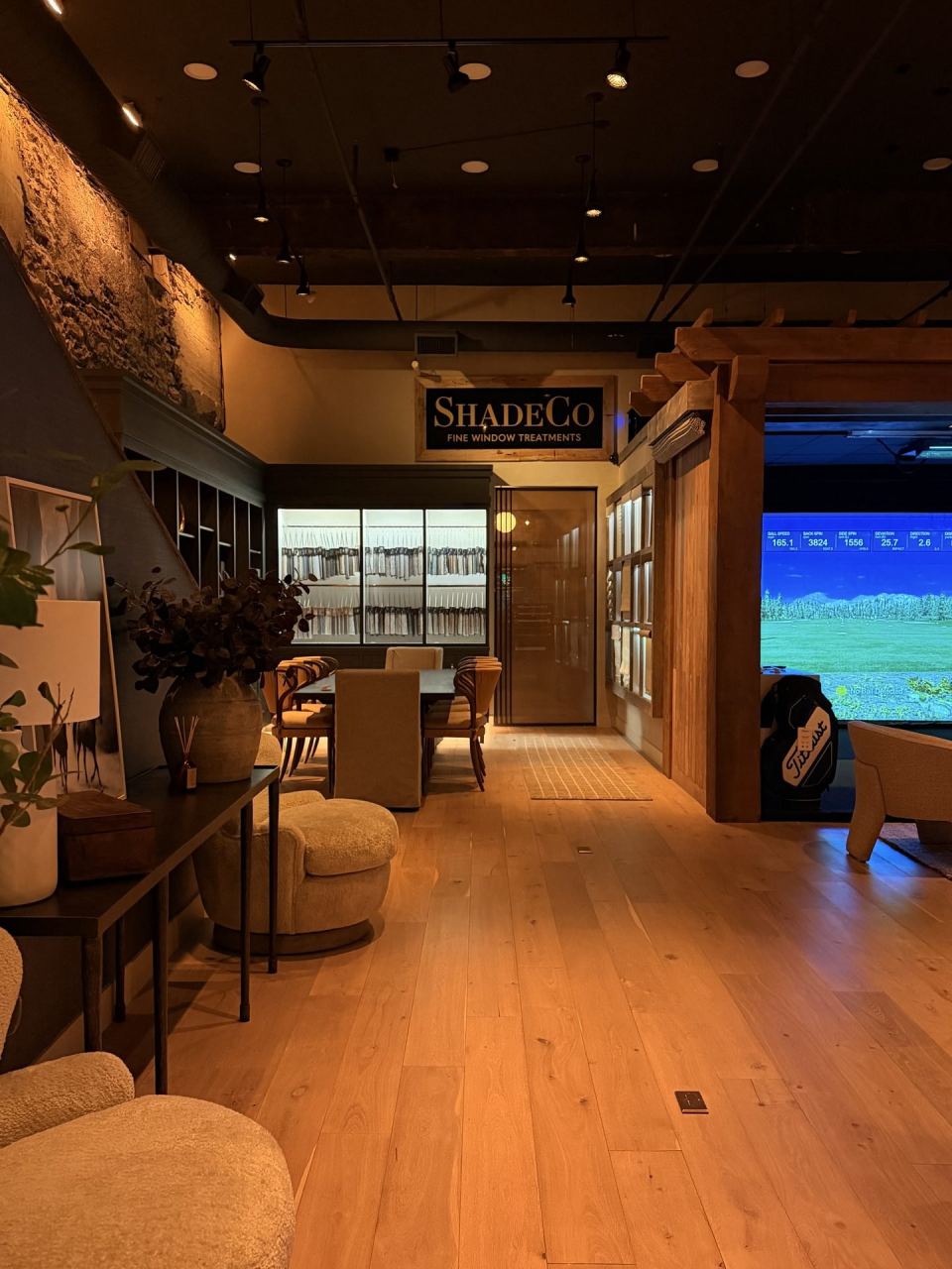 Cast showroom — warm wood hallway