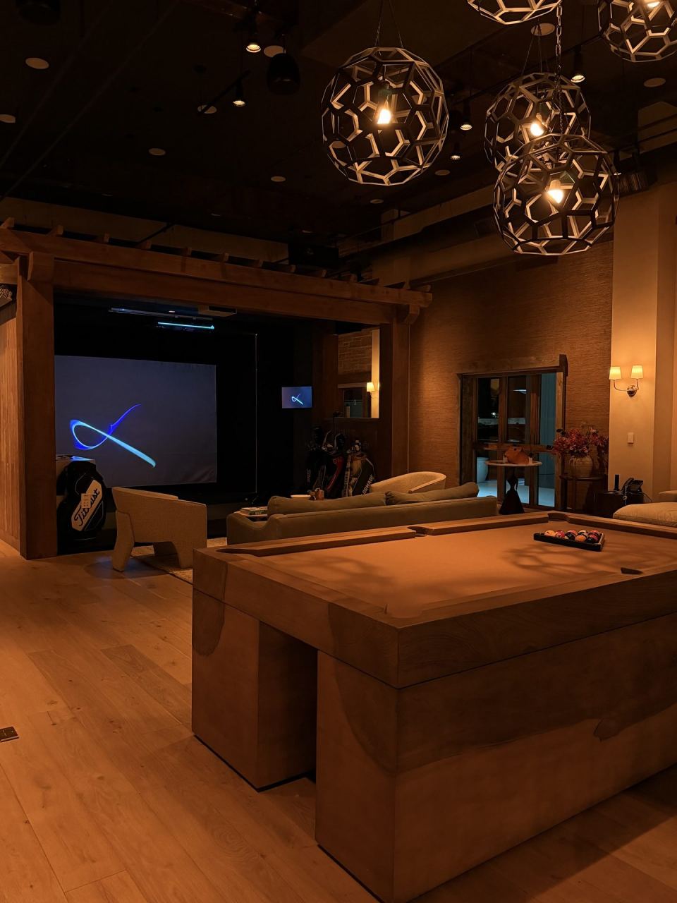 Cast showroom — pendant lighting over the bar