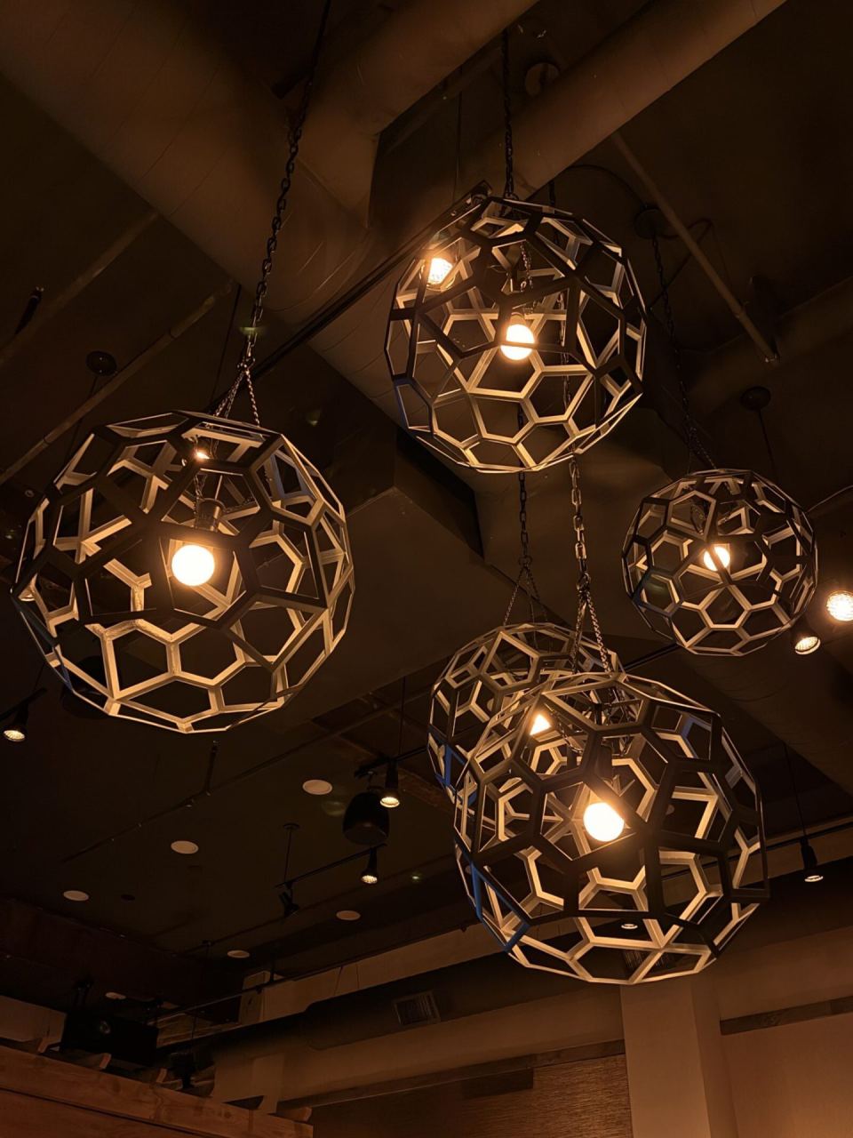 Warm-tuned Ketra pendants &mdash; Cast showroom