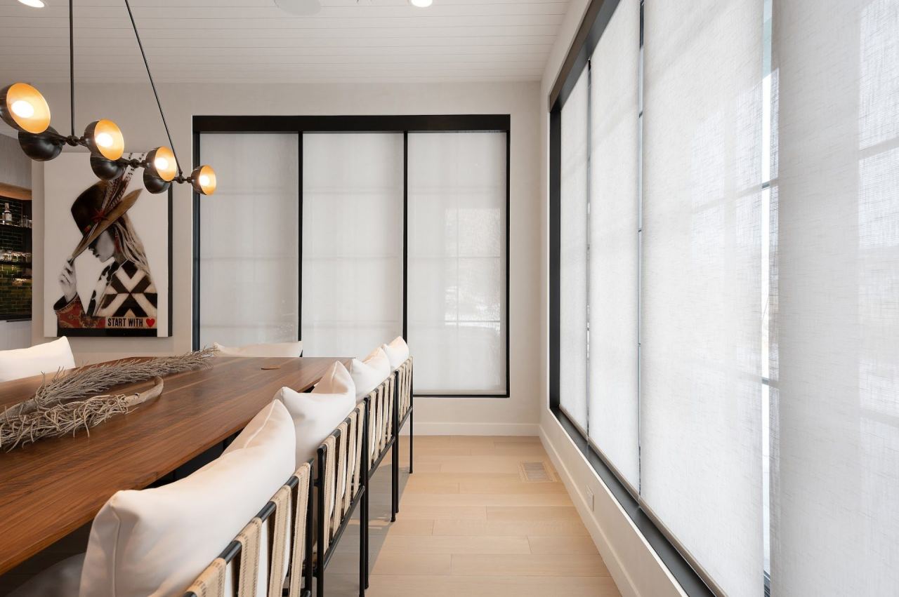 Bedroom with motorized roller shades and architectural lighting &mdash; Park City home by Techi