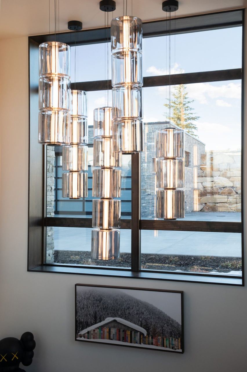 Wine room with controlled architectural lighting &mdash; Park City home by Techi