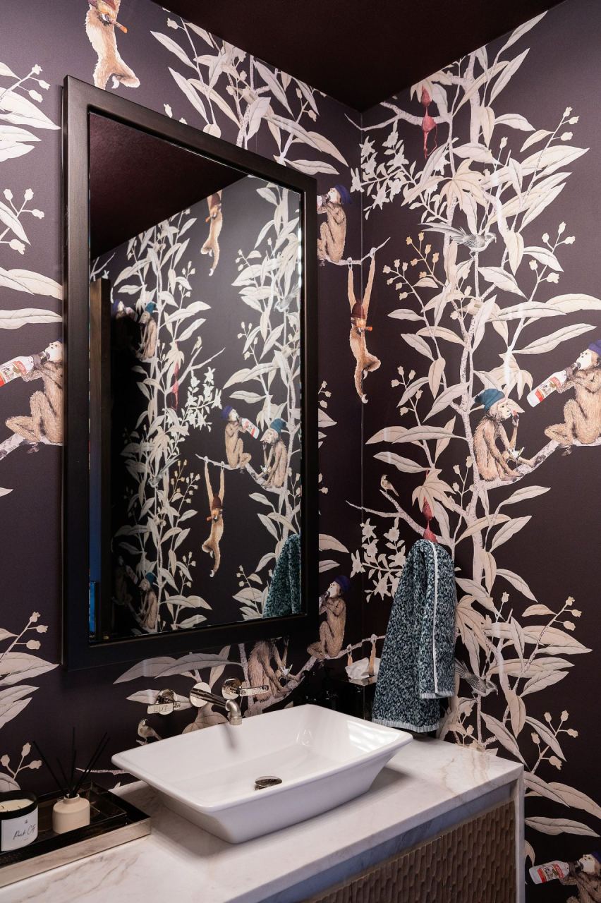 Powder room with bold figurative wallpaper &mdash; Park City luxury home by Techi