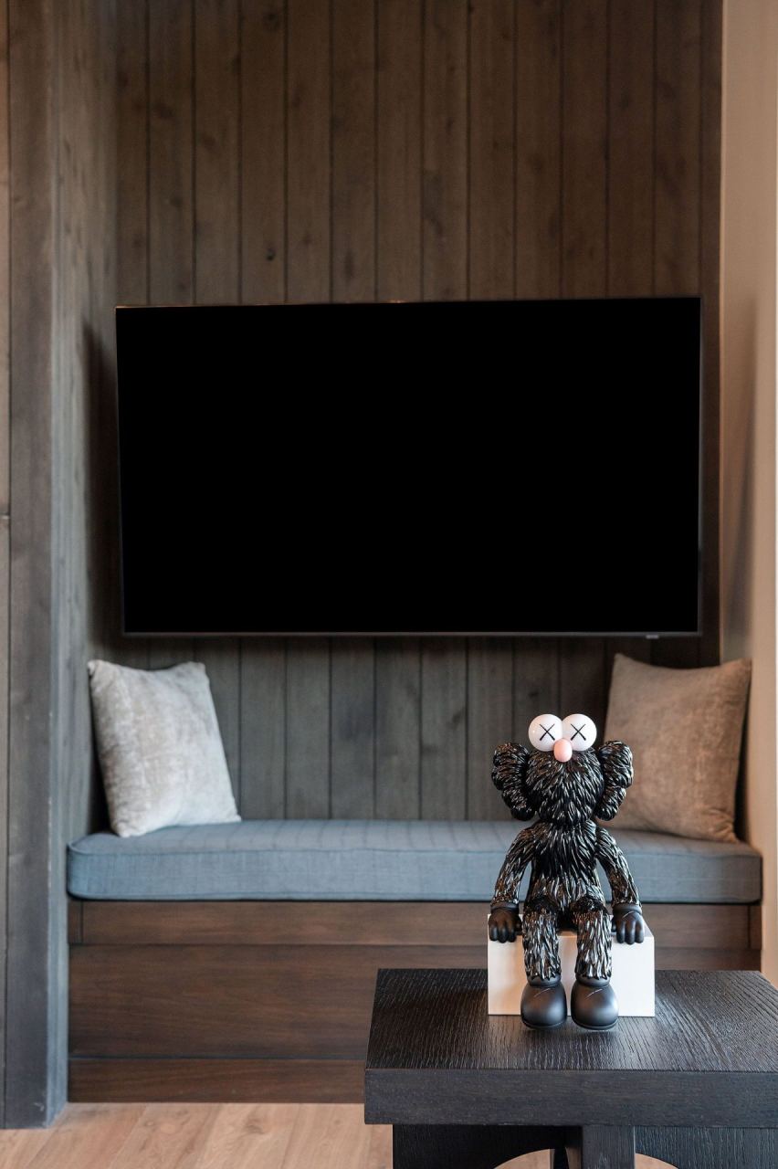 TV media wall with KAWS Companion figurine &mdash; Wasatch Back home by Techi
