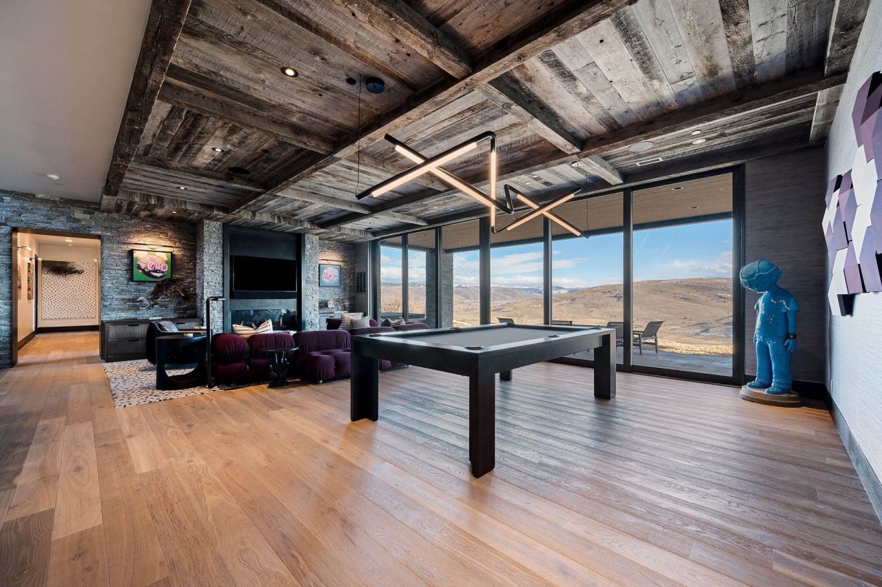 Living room with vaulted ceiling and integrated audio &mdash; Wasatch Back home by Techi