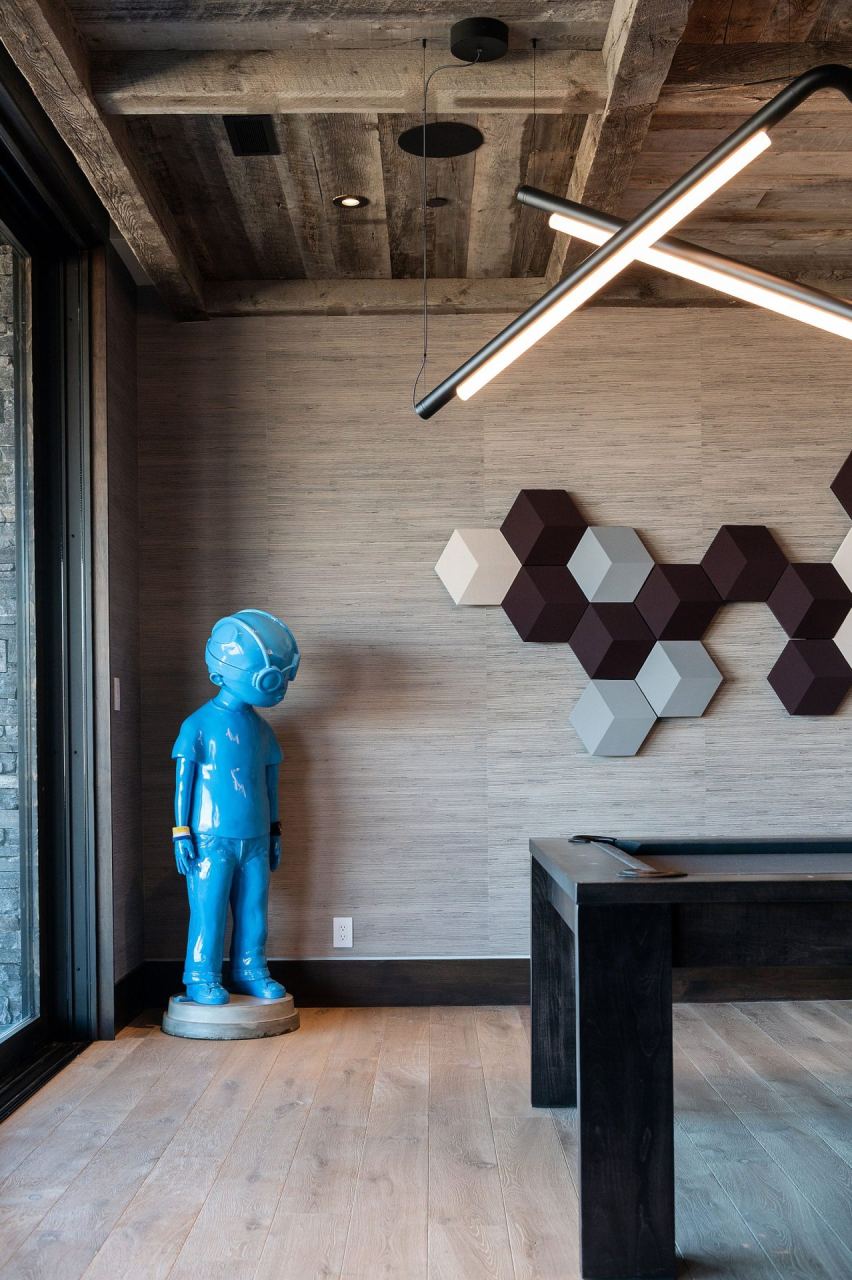 Blue boy figurine with B&O hex acoustic panels &mdash; Park City home by Techi