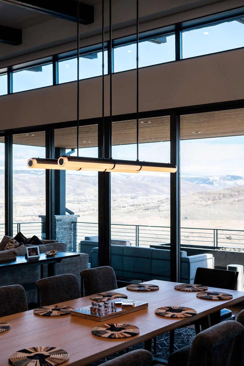 Stone fireplace with concealed TV and integrated sound &mdash; Wasatch Back home by Techi