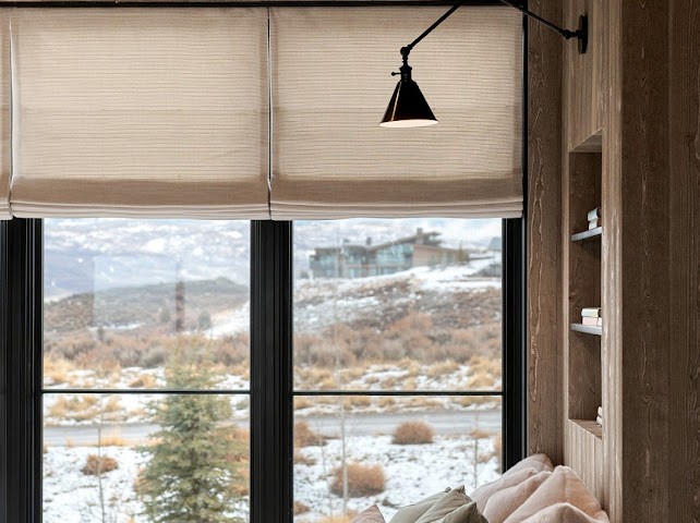 Hand-finished Roman shades — bedroom with mountain view