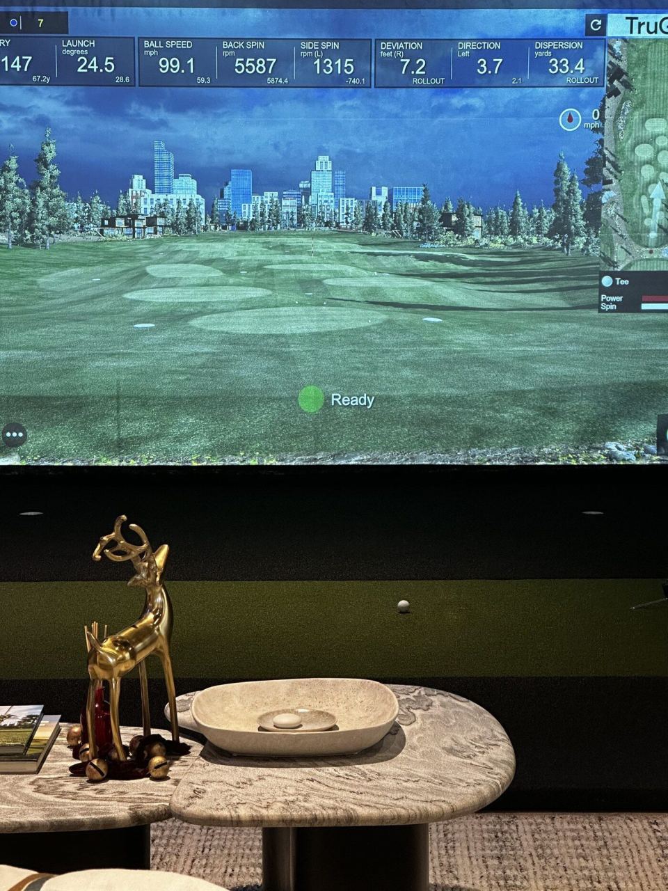 TruGolf simulator screen &mdash; Cast showroom